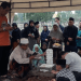 Suasana pemakaman Dufi, pria yang ditemukan tewas dalam drum di Bogor, di TPU Semper, Senin (19/11/2018).(Kompas.com)