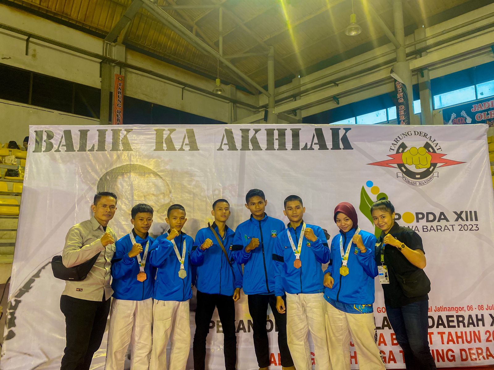 
Cabor tarung derajat dan pencak silat meraih medali pada perhelatan POPDA XIII Jawa Barat, Bandung, Sabtu (8/7/2023). (Foto: andre/dara)

